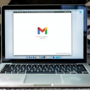 Email on laptop screen with Gmail logo Email on laptop screen with Gmail logo