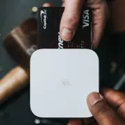 fintech_gadgets_apps_opt Fintech transaction using tech gadgets and a payment card