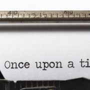 Typing machine paper reading “Once upon a time” Typing machine paper reading "Once upon a time"