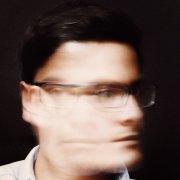 Fuzzy and blurry image of a person having a headache or being of two minds Fuzzy and blurry image of a person having a headache or being of two minds